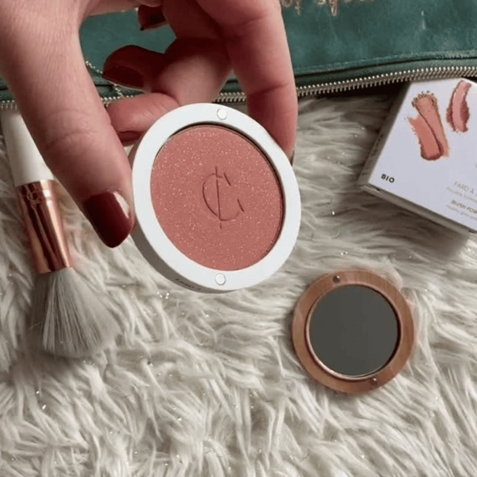 blush rouge with hands and rug