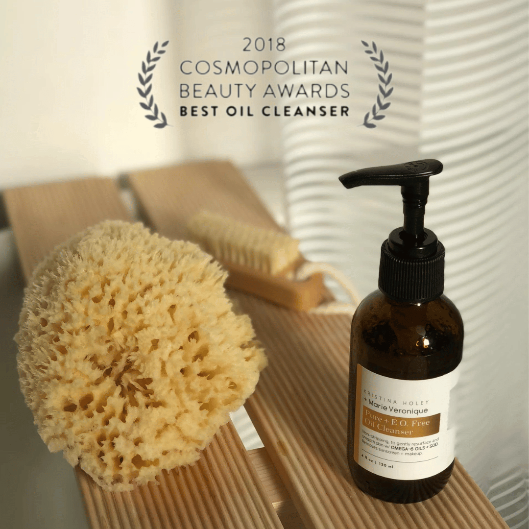 marie véronique oil cleanser near bathroom with award crest