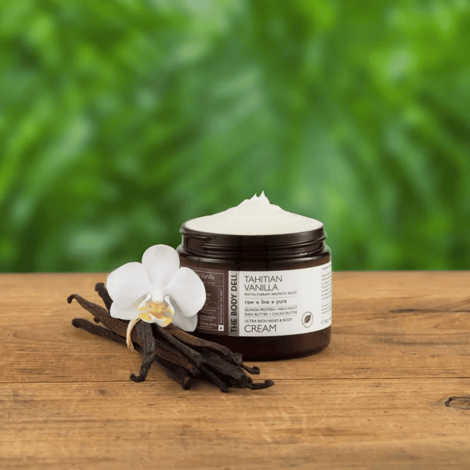 body deli cream on wood with plants