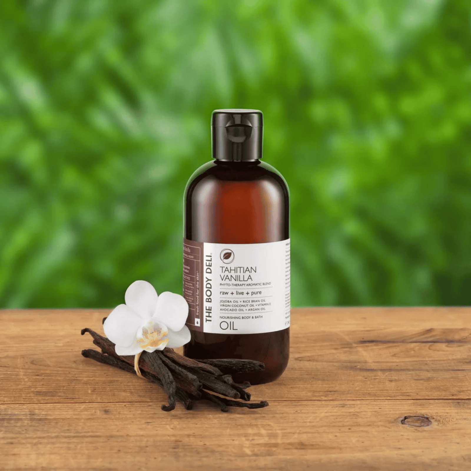 body oil with stick of vanilla and orchid