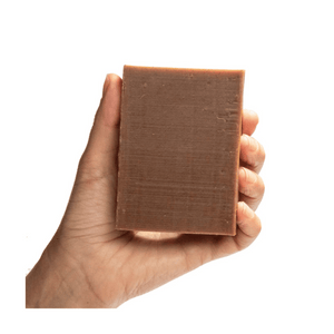 ground soap backbone in a hand